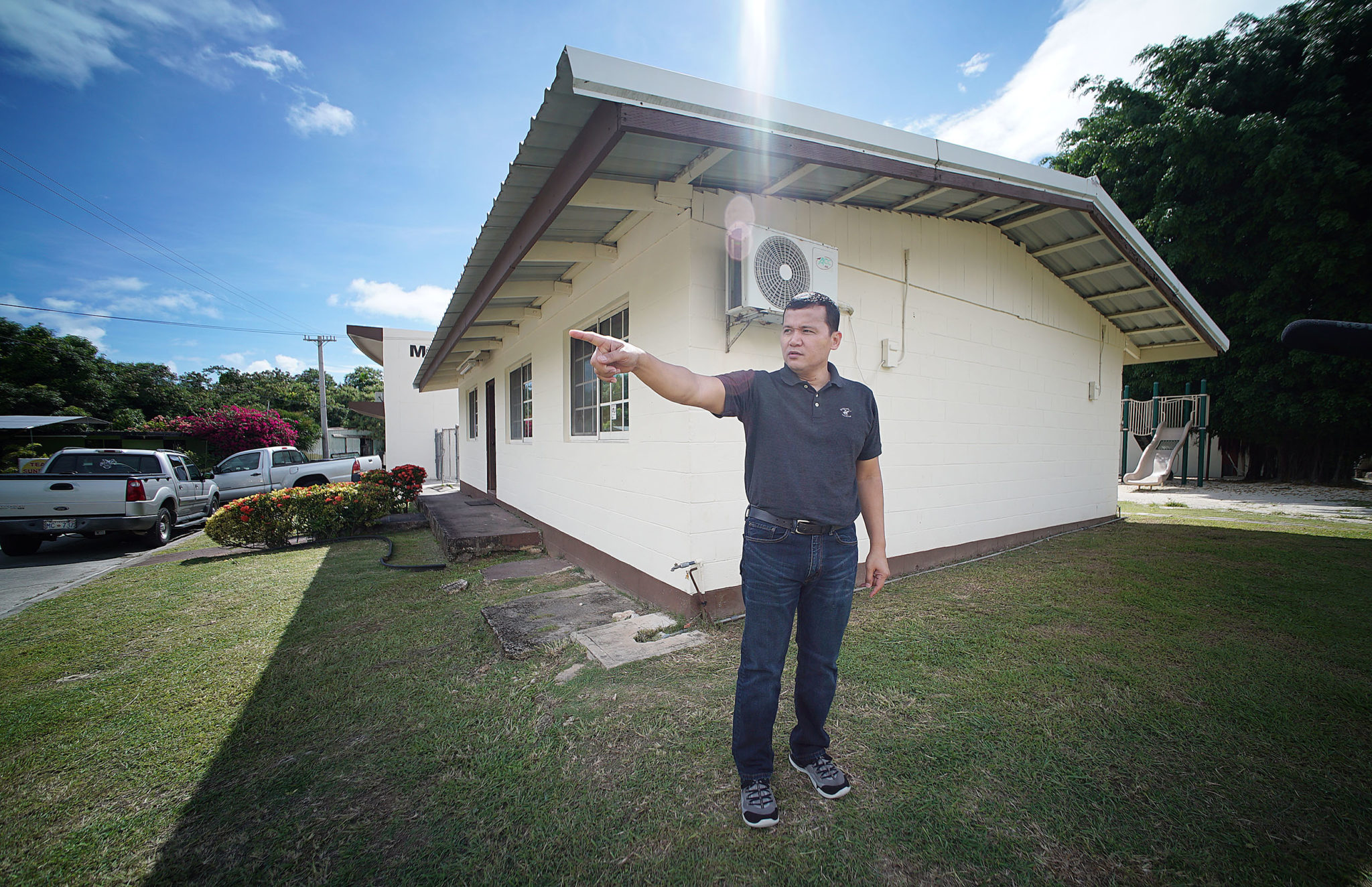 Roy Quintanilla stands outside the former Father Anthony Apuron’s living quarters where Quintanilla alledges Apuron sexually assaulted him in the corner room. Hagat, Guam.